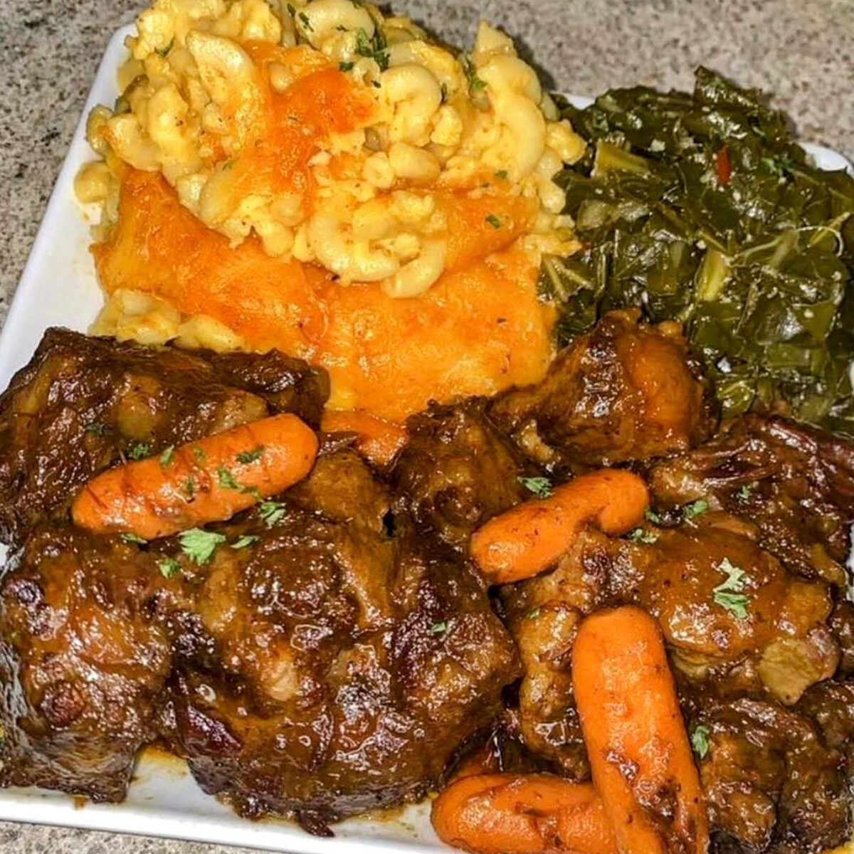 Tender slow-braised oxtails with rich gravy over rice